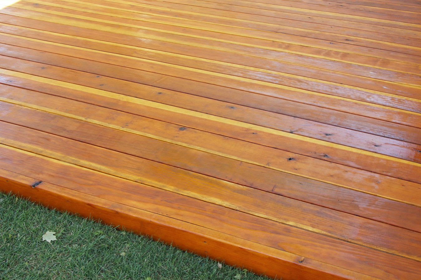 Deck staining and sealing